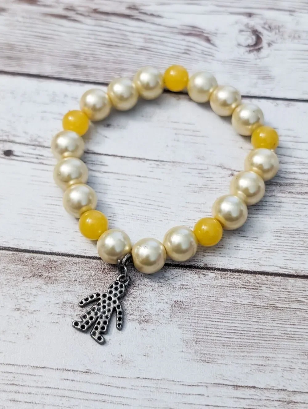 Vintage Stretch Bracelet - Cream & Yellow with Man Charm